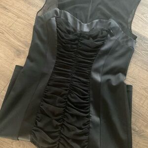 Stunning black dress by Cache’, size 12, ruched center
